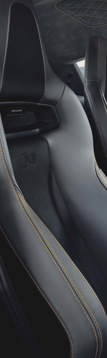 Interior view of the R8 Coupé V10 performance RWD with sports seats with yellow stitching and yellow details 